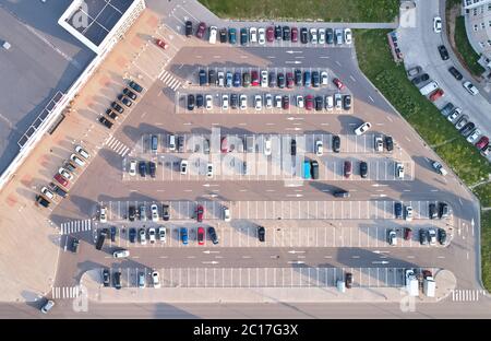 Parking lot with empty spaces above top drone view Stock Photo