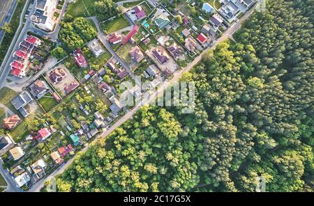 Neighborhood in green forest park aerial above top view Stock Photo