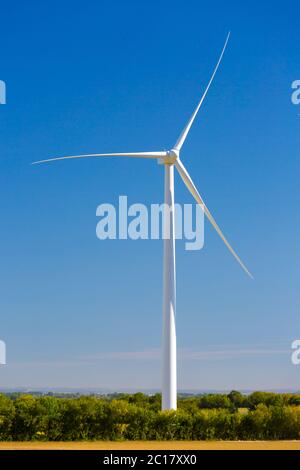 Wind turbines generating electricity with blue sky - energy conservation concept Stock Photo