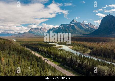 Alberta, Canada, aerial view of vehicles on scenic Icefields Parkway highway between Banff and Jasper National Parks during summer. Stock Photo