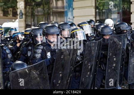 Paris, France. 13th June, 2020. Riot police charge protesters and use tear gas to disperse them during the rally organized by the Adama Commitee. Stock Photo