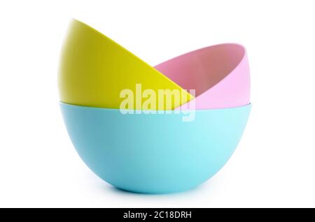 Plastic colorful plates isolated on white Stock Photo