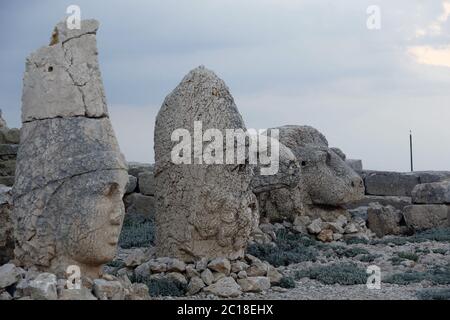 Ankara. 14th June, 2020. Photo taken on June 14, 2020 shows statues at the tomb-sanctuary on the top of Mount Nemrut in Turkey. Mount Nemrut lies in Turkey's southeastern province of Adiyaman. In 1987, it was listed as a UNESCO World Heritage Site. Mount Nemrut is known for the ruins of the tomb-sanctuary on its top. Credit: Mustafa Kaya/Xinhua/Alamy Live News Stock Photo