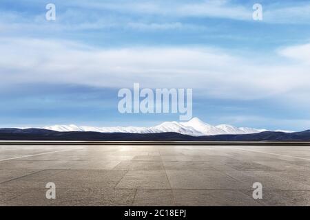 empty marble floor with snow mountains Stock Photo
