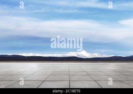 empty marble floor with snow mountains Stock Photo