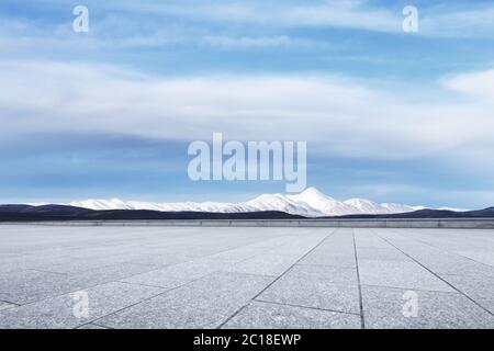 empty marble floor with snow mountains Stock Photo