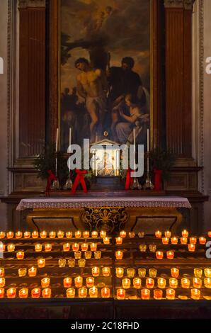 Icon and candles in cathedral at Salzburg Austria Stock Photo