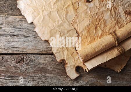 Old paper with the burned edges Stock Photo
