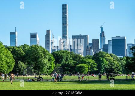 New York, USA. 14th June, 2020. People crowd Central Park as the city relaxed restrictions set by the coronavirus outbreak. Credit: Enrique Shore/Alamy Live News Stock Photo