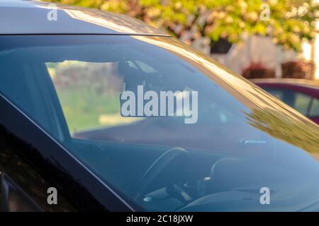 Windshield of sheriffs car with dashboard camera Stock Photo