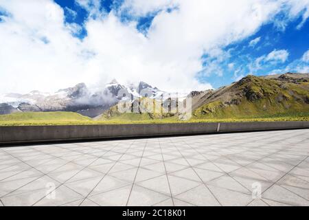 empty marble floor with beautiful snow mountains Stock Photo