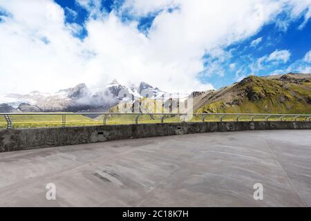 empty marble floor with beautiful snow mountains Stock Photo
