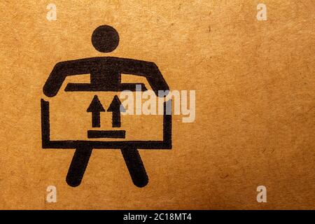 Packaging symbol to indicate heaviness and indicates which direction is upwards Stock Photo