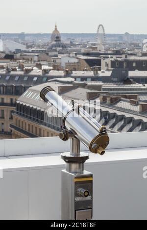 Binoculars telescope and view on Paris Stock Photo