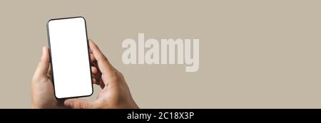 man using  Mock up a Cell Phone With Blank Screen space banner Stock Photo