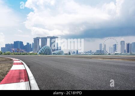 empty asphalt road with cityscape of modern city Stock Photo