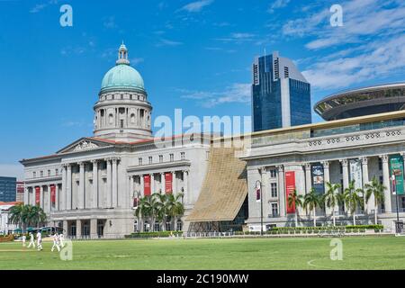 View across the Padang towards the Singapore National Gallery, formerly the Supreme Court and Town Hall; in the former colonial district of Singapore Stock Photo