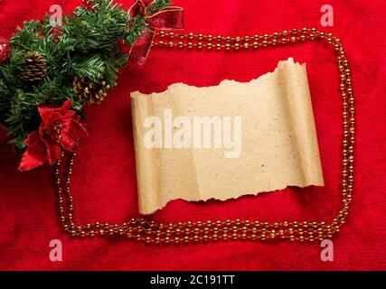 Christmas vintage scroll on red background Stock Photo