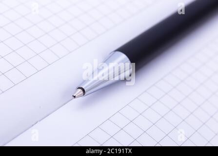 close-up of ball point pen over paper Stock Photo