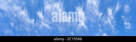 Cirrus clouds in the blue sky - panoramic detail Stock Photo