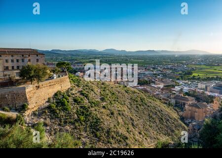 View to the mountains and the center of Orihuela, Spain during sunset Stock Photo
