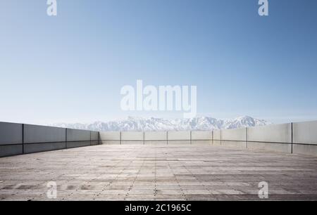 empty brick floor with snow mountains Stock Photo
