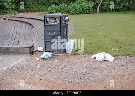 Overflowing litter bin in a popular Norfolk beauty spot Stock Photo