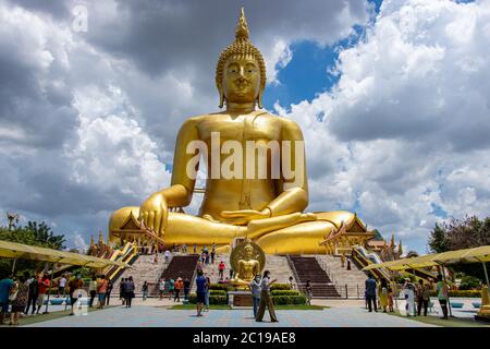 AYUTTHAYA,THAILAND, JUN 03 2020, The large golden sitting Buddha statue at Wat Muang temple located Ang Thong and Ayutthaya. Stock Photo