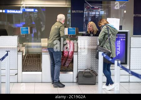 Duesseldorf, Germany. 15th June, 2020. Travellers to Mallorca check in their luggage at Düsseldorf Airport. The travel warning for 27 European countries was lifted during the night to Monday (15.06.2020). Credit: Marcel Kusch/dpa/Alamy Live News Stock Photo
