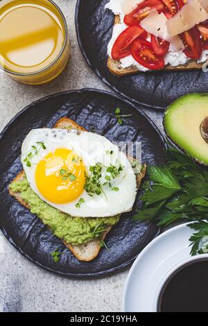 Breakfast toasts with coffee on the table. Stock Photo