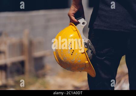 Engineer or construction worker checking location site on the background of construction site Stock Photo