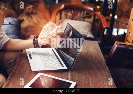 Light blub on businessman hands. Idea, strategy and success concept. Stock Photo