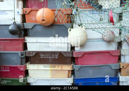 Fishing crates, buoys and other maritime objects in front of the old bar Blaue Maus on the North Fri Stock Photo