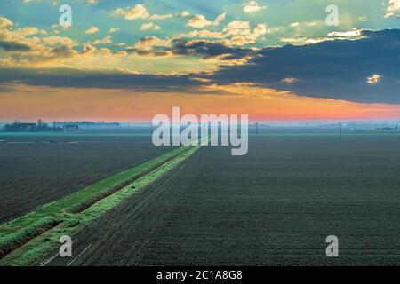 Winter sunrise in the lower Po Valley plain. Bologna province, Emilia Romagna, Italy. Stock Photo