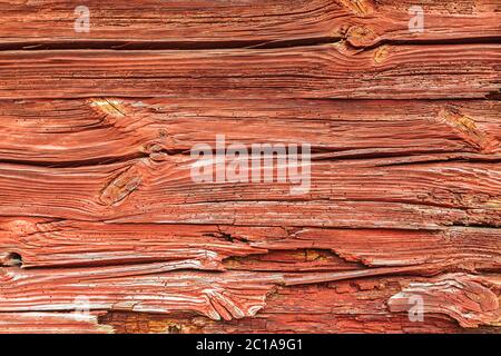 Background of a typical old red painted wooden wall in Sweden Stock Photo