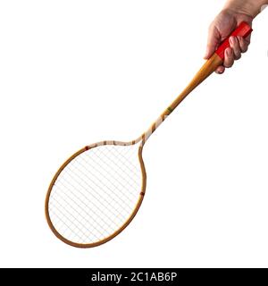 Vintage wooden badminton racket in hand isolated on white background Stock Photo