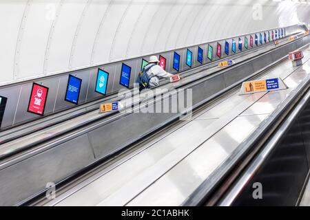 Covid 19-deserted escalators at London Leicester Square Tube Station.London,England Stock Photo