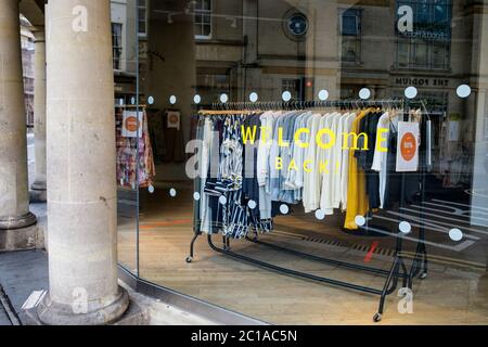 Bath, UK. 15th June, 2020. As non essential shops in England are given the green light by the government to reopen, a welcome back sign is pictured in a shop window in New Bond street.   Credit: Lynchpics/Alamy Live News Stock Photo