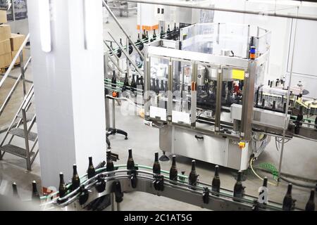 Industrial production shot with champagne bottles Stock Photo