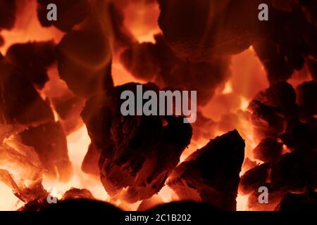 Fire flames with reflection on black background Stock Photo