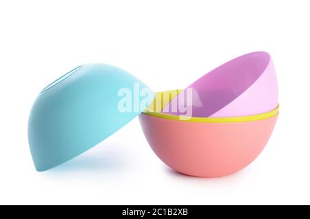 Plastic colorful plates isolated on white Stock Photo