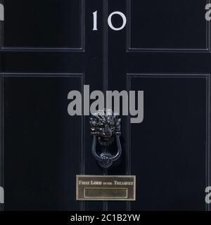 10 Downing Street, iconic and famous black door and knocker at the residence of the British Prime Minister, Westminster, London, UK Stock Photo