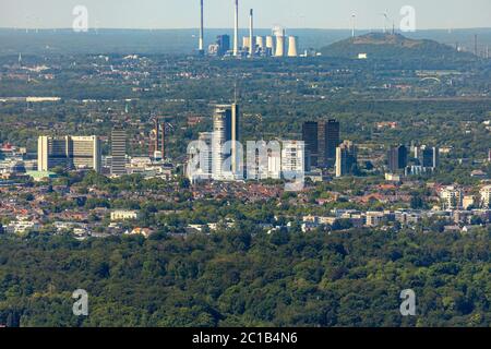 Aerial view, skyline Essen, view to the north over city centre with city hall Essen and RWE tower, to Uniper power plants and wind park Halde Oberscho Stock Photo