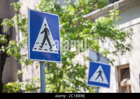 Pedestrians In Road Ahead warning sign by the road in Oxfordshire ...