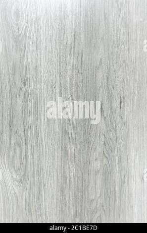 Light white washed soft wood texture surface as background. Grunge whitewashed varnished wooden planks table pattern top view. Stock Photo