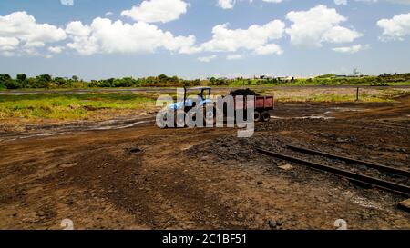 Asphalt mining in the Pitch Lake, La Brea in Trinidad and Tobago Stock Photo