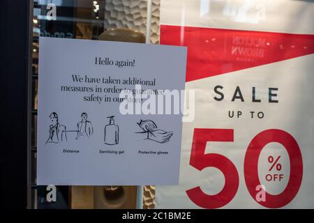 United Kingdom,15 June 2020: Shops and stores are back open re-open in the UK as coronavirus covid restrictions are lifted 2m social distance Stock Photo