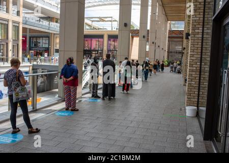 United Kingdom,15 June 2020: Shops and stores are back open re-open in the UK as coronavirus covid restrictions are lifted 2m social distance Stock Photo