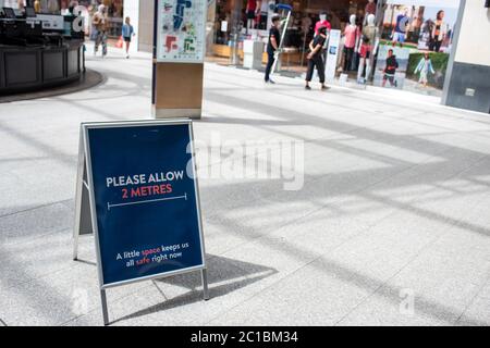 United Kingdom,15 June 2020: Shops and stores are back open re-open in the UK as coronavirus covid restrictions are lifted 2m social distance Stock Photo