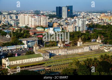 Yangon Central Railway Station and The Yangon Skyline, Yangon, Myanmar. Stock Photo